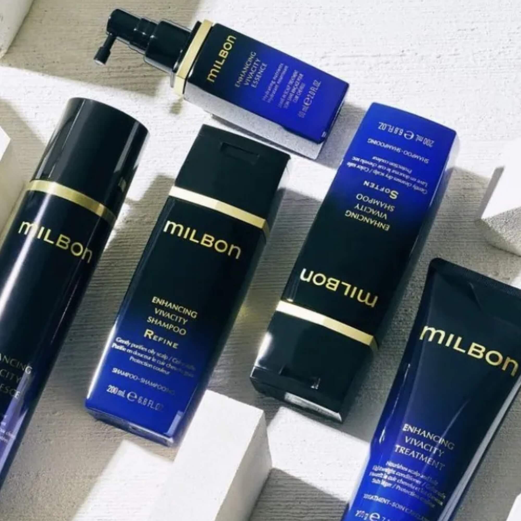 Milbon Enhancing Vivacity hair care line including shampoo, treatment, and scalp essence for revitalizing hair and scalp