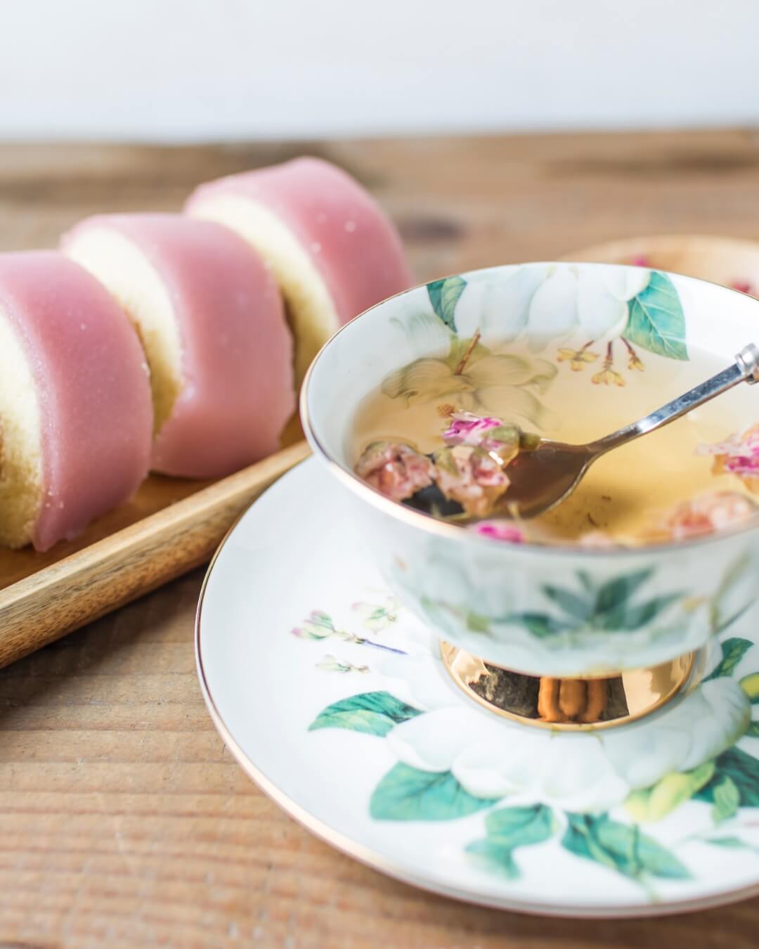 Herbal tea served with cake as complimentary treats at Vital Glow Head Spa